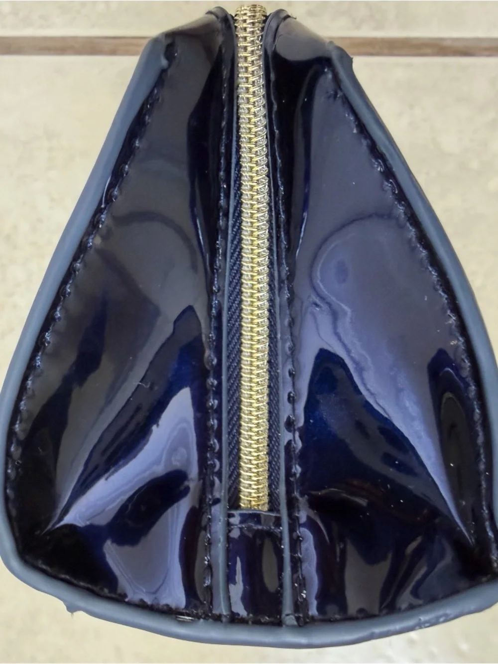 Patent Leather Navy Clutch Bag with Gold Accent